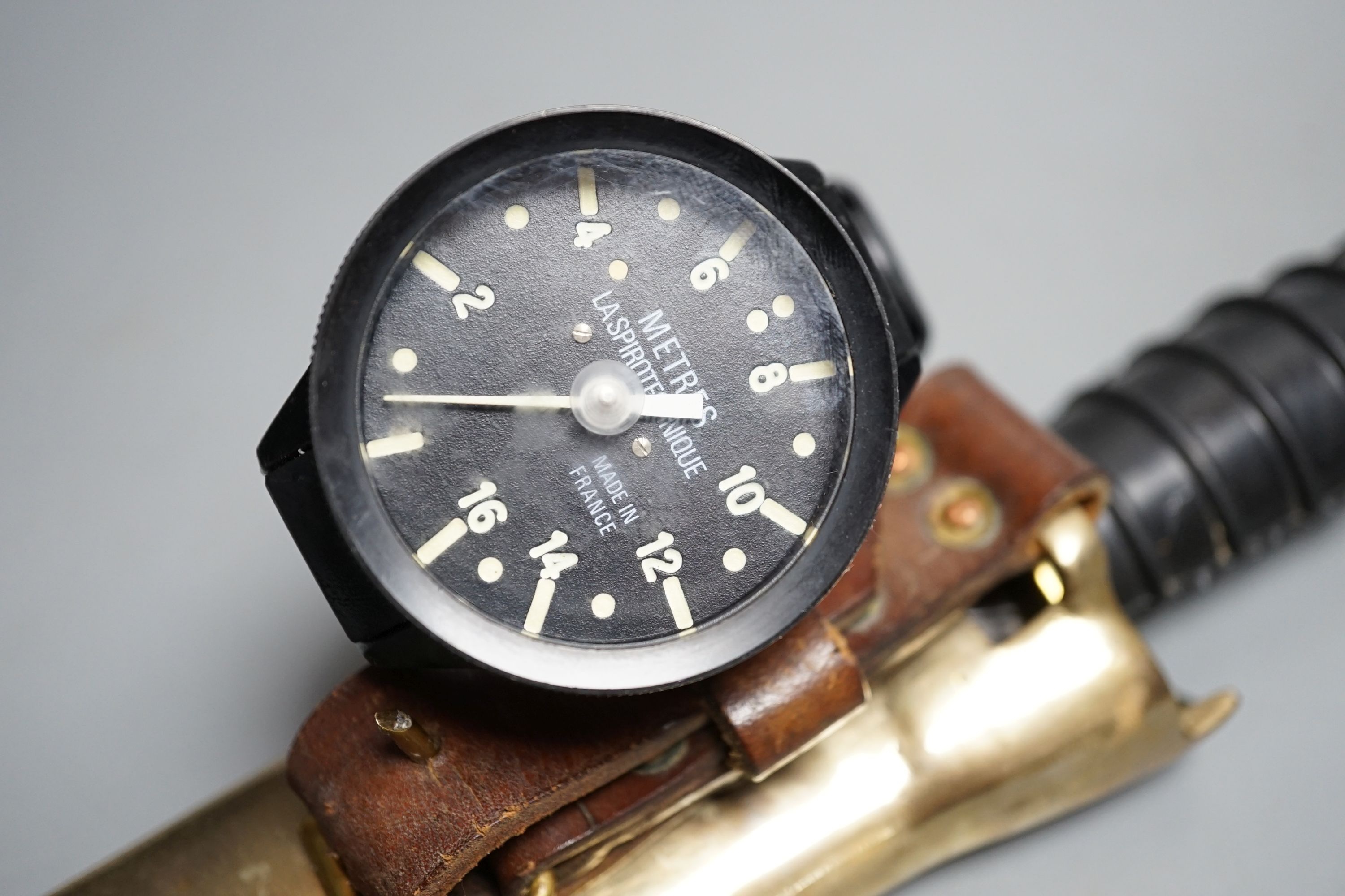 A Russian diver's knife, Spirotechnique diver's wristwatch, Knife 32 cms long.